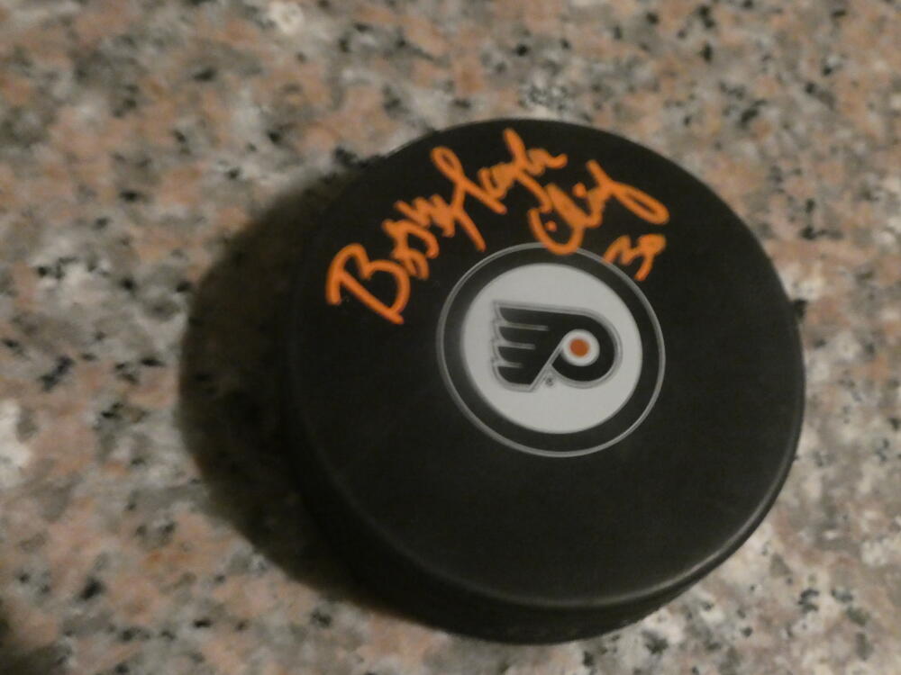 Bobby Taylor Philadelphia Flyers Signed Logo Puck COA Orange Inscription